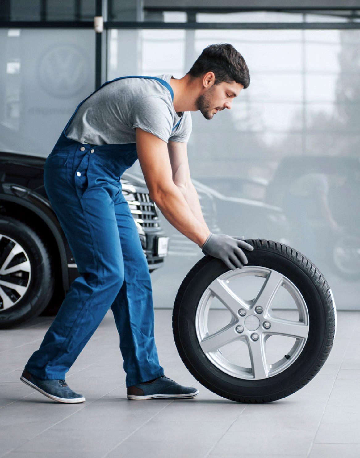 Man moving tire info-1